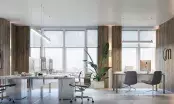Bureau moderne avec deux luminaires linéaires suspendus, grandes baies vitrées et mobilier design.