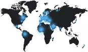 Carte du monde des implantations du Groupe LBA, continents sombres et zones de présence en bleu