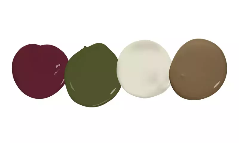 Quatre pastilles de peinture alignées, un bordeaux profond, un vert olive, un blanc crème et un brun café